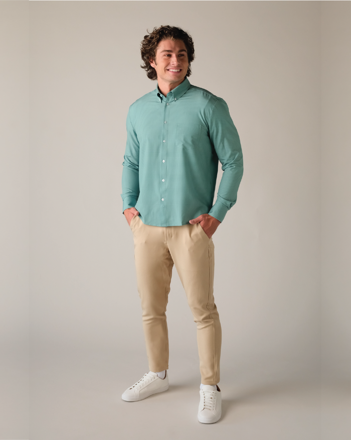 A man wearing green shirt w/grids