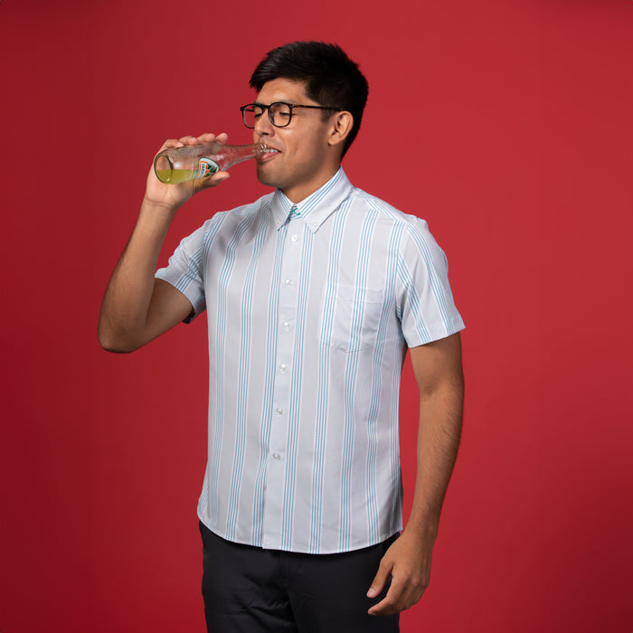 Man wearing Grey shirt with blue and white stripes