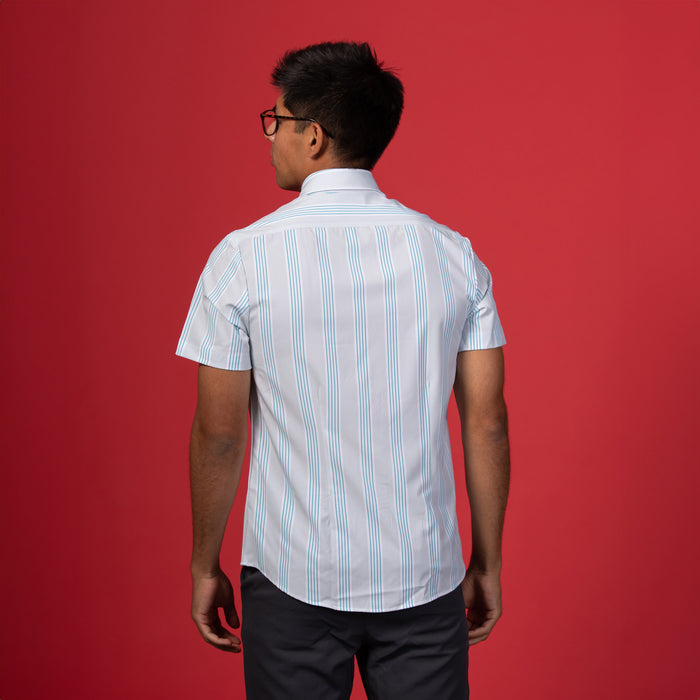 Man wearing Grey shirt with blue and white stripes