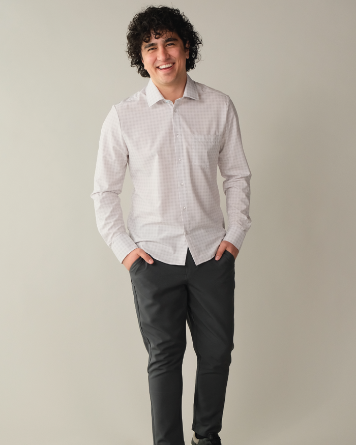 Man wearing grey shirt with small white windowpane