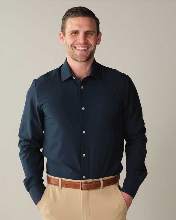 Man wearing a navy dress shirt