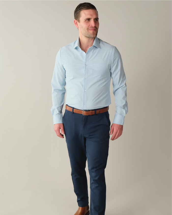 Man wearing a pale blue dress shirt