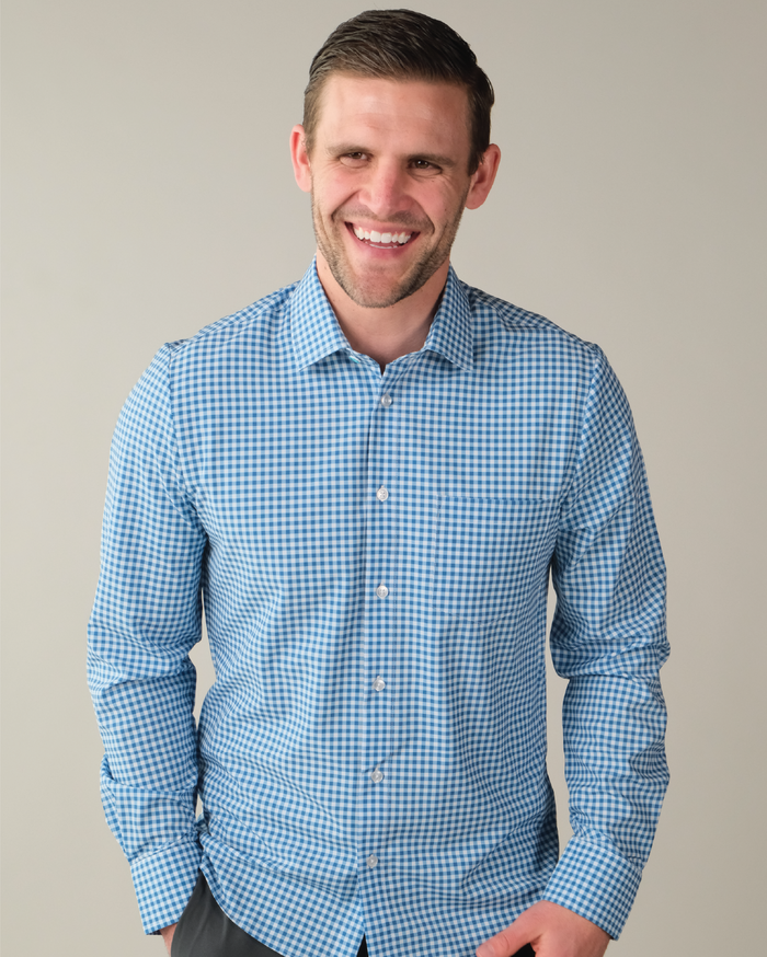 Man wearing royal blue and white gingham shirt