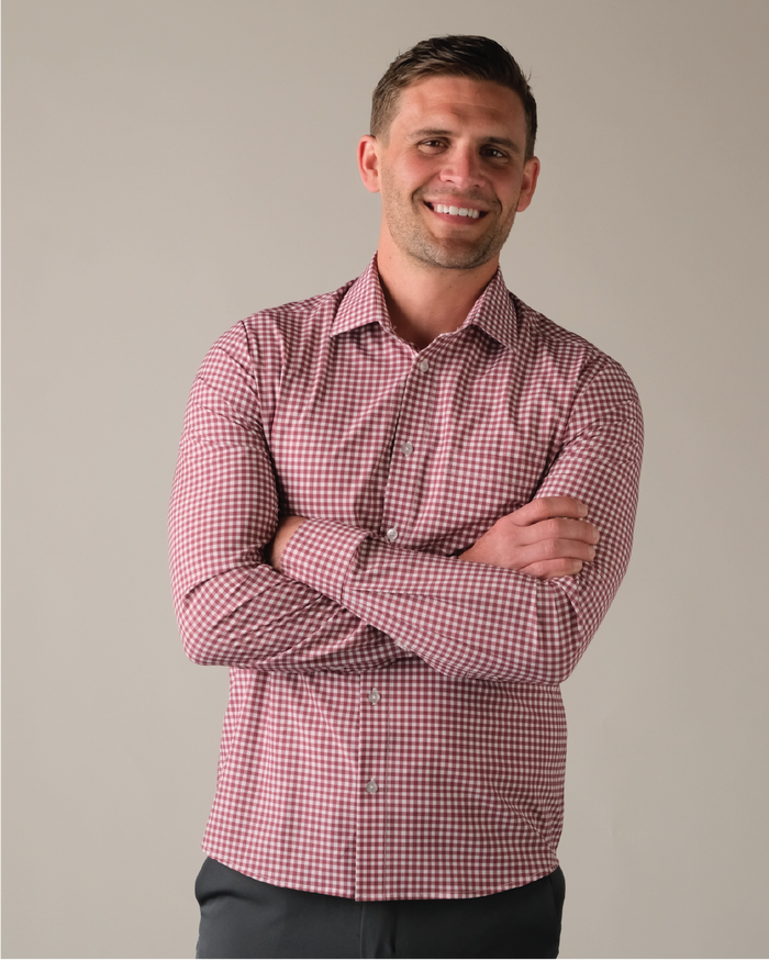 Man wearing a white and oxblood gingham shirt