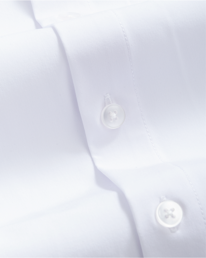 Close up white button down collar dress shirt fabric