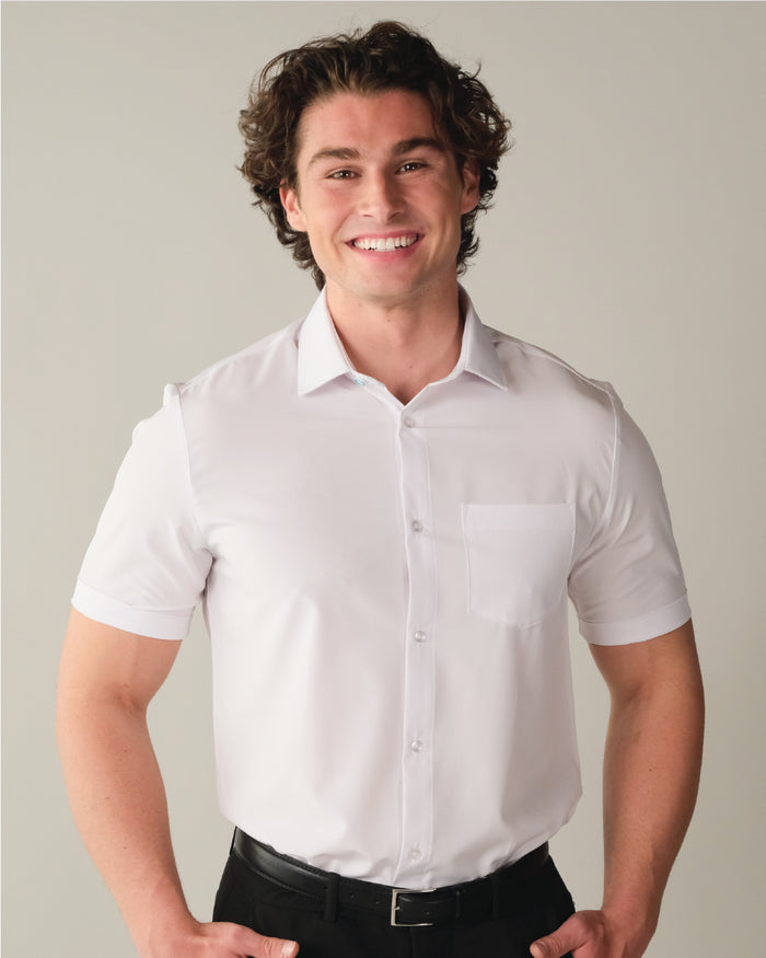 Man wearing a short sleeve white dress shirt