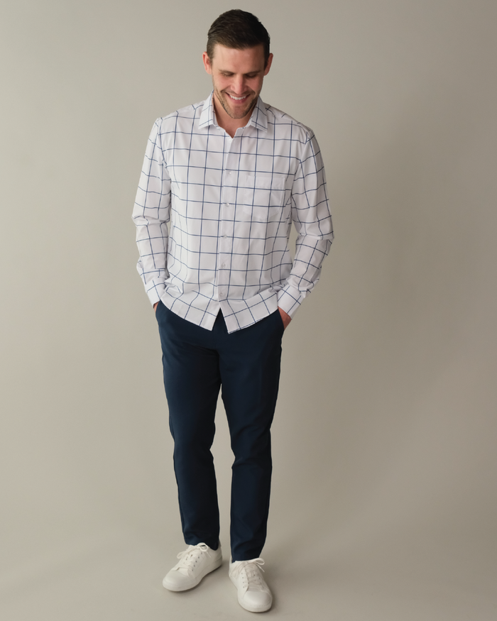 Man wearing a white shirt with navy windowpane