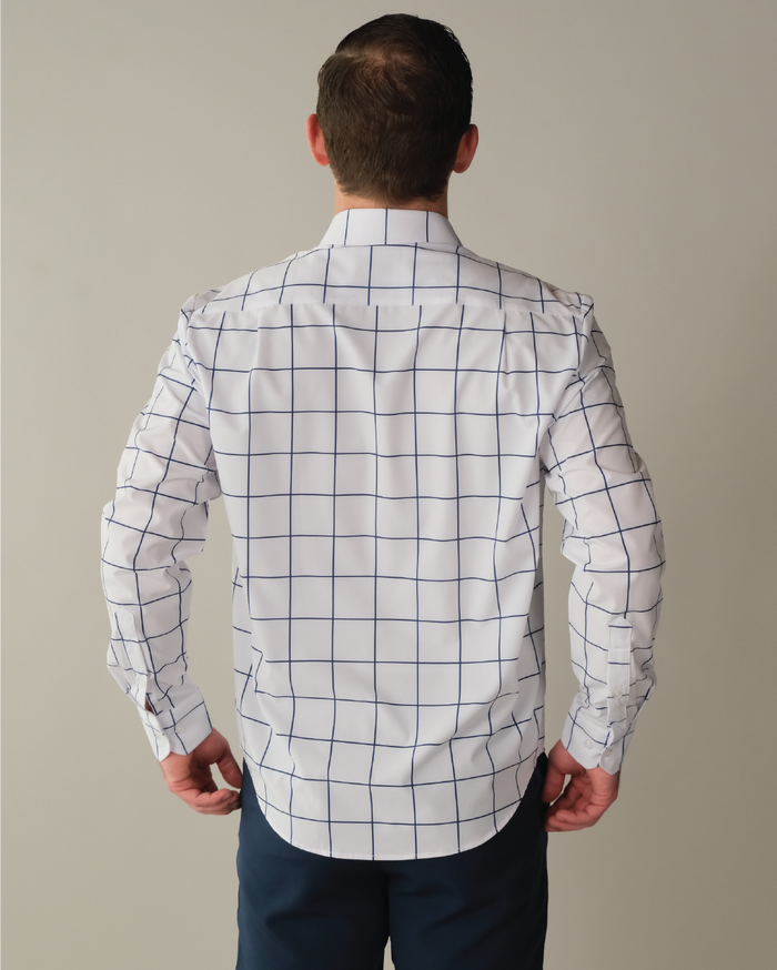 Man wearing a white shirt with navy windowpane