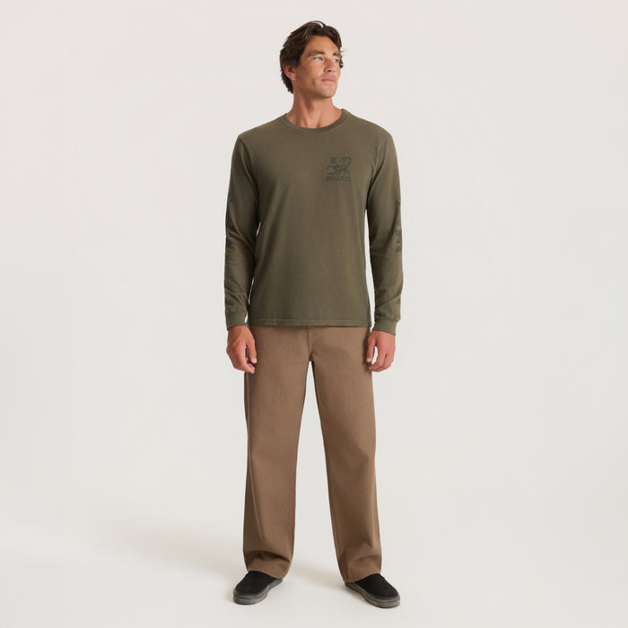 Khaki long-sleeve Reading Ritual Premium Tee with small chest logo, worn with tan pants on male model against neutral background