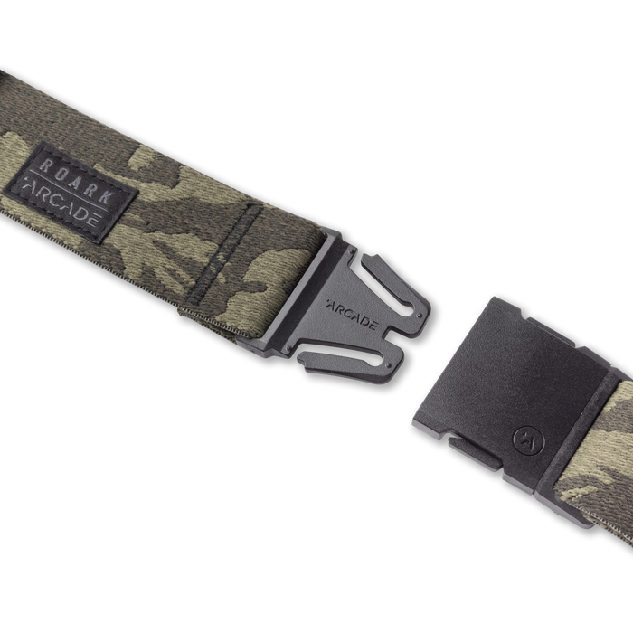 Adjustable Roark Arcade Belt featuring military camouflage pattern with a durable buckle and strap, ideal for outdoor and adventure travel.