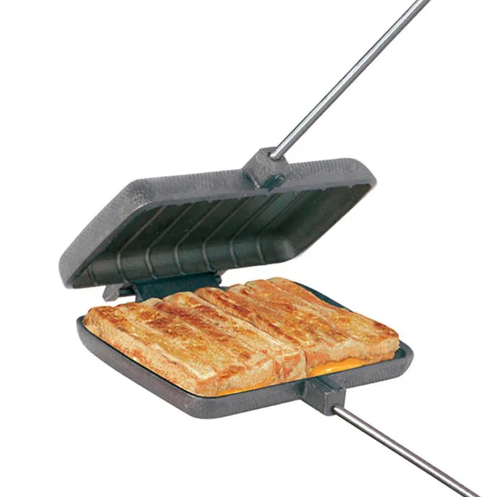 Black Cast Iron Rome Double Pie Iron 1605 Open Showing Two Grilled Cheese Sandwiches - Close-Up Detail | United RV Parts