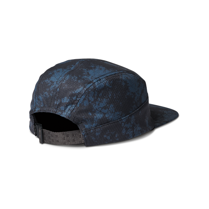Rear view of the Run Amok five-panel cap, showcasing an adjustable strap and a blue-black splatter pattern. Designed for comfort and versatility during any activity.