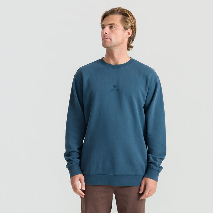 Dark navy long-sleeved hooded T-shirt designed for adventure and travel by Roark, ideal for outdoor activities.