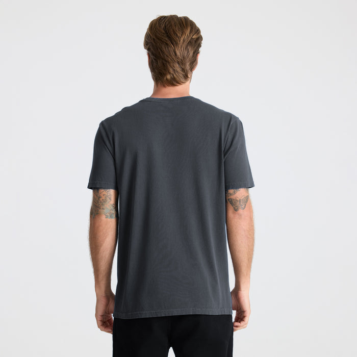 Grey active shirt designed for adventure and outdoor activities by Roark, showcasing durability and comfort for travel enthusiasts.