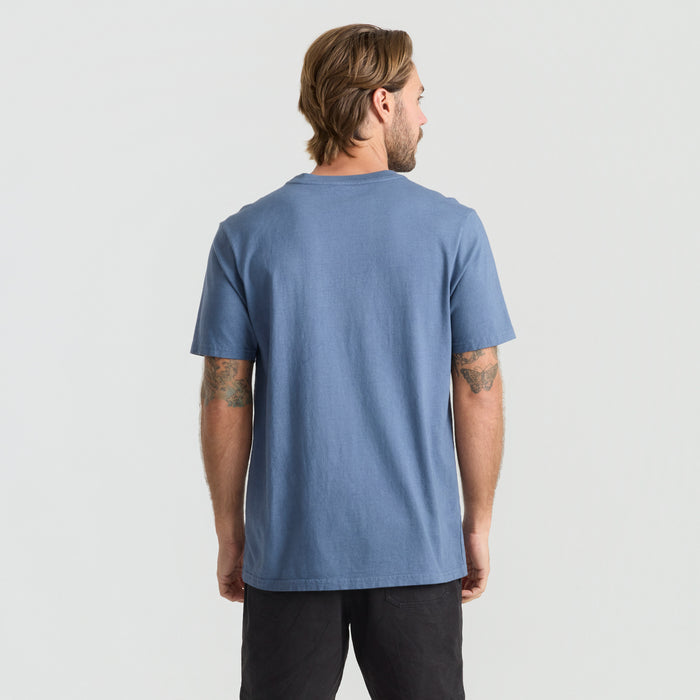 Active shirt designed for adventure by Roark, perfect for outdoor and travel enthusiasts.