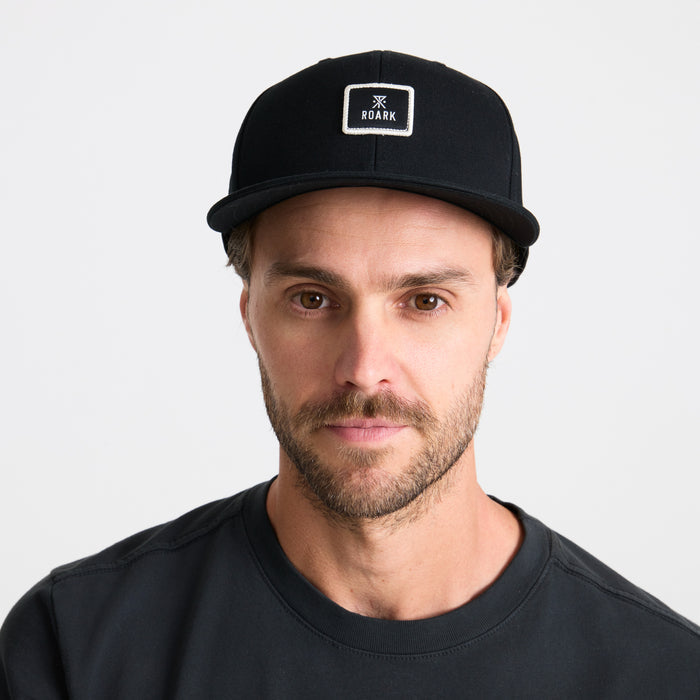 Stylish black sun hat perfect for adventure and outdoor travel by Roark