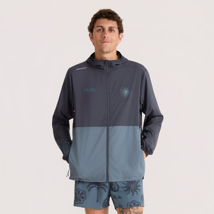Roark Second Wind Jacket in ebony and slate blue colorblock worn by male model on neutral background
