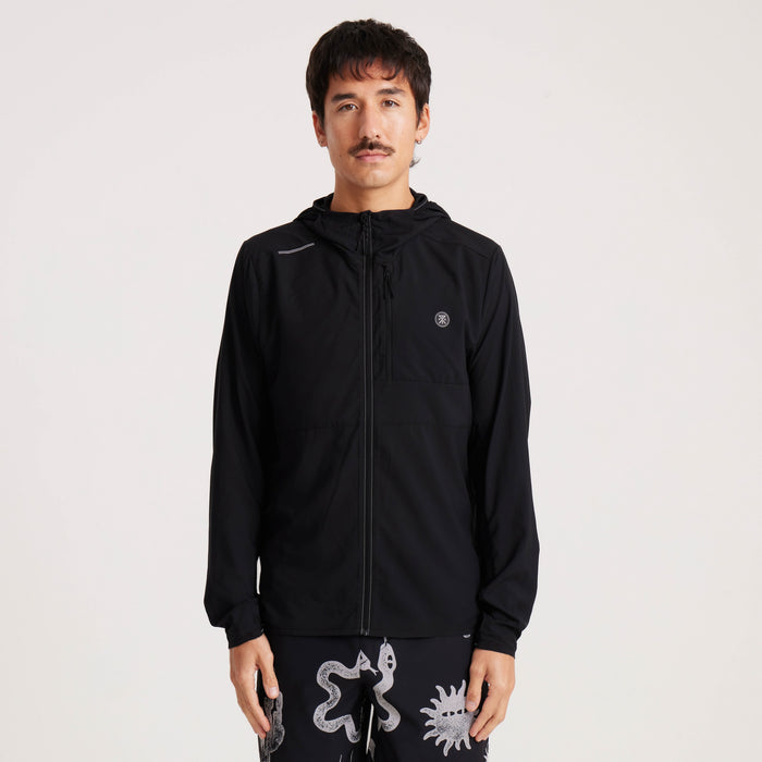 Front view of the Roark black windbreaker jacket, featuring a minimalist design with a sleek logo detail for versatile outdoor wear.
