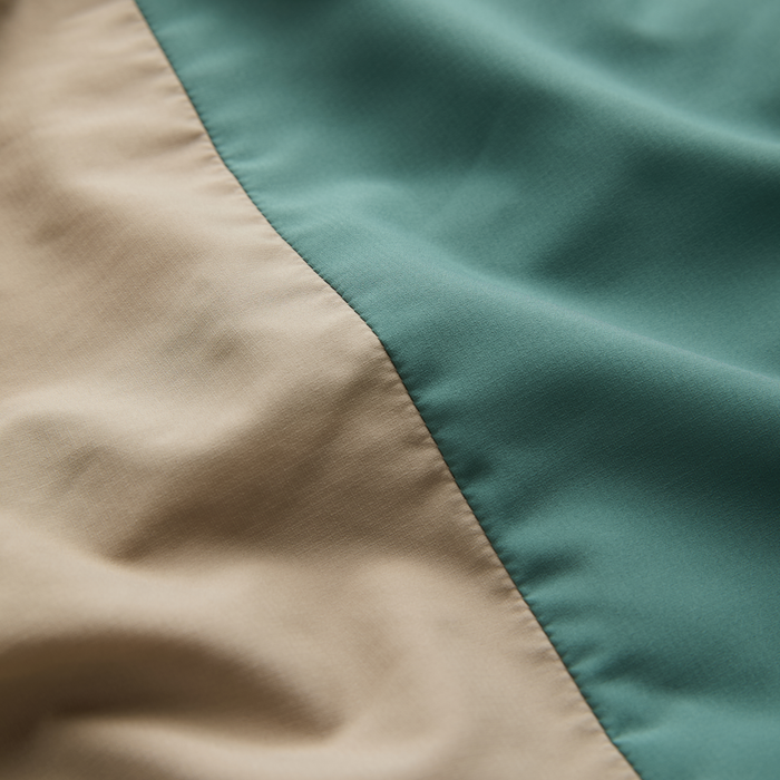 Vibrant silk scarf with intricate patterns, ideal for adding a touch of style and comfort on outdoor adventures.