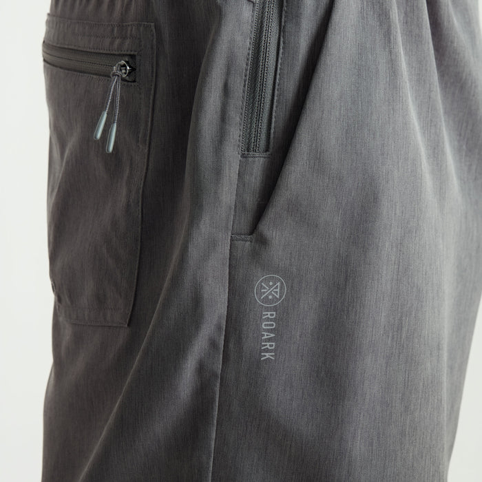 Active pants featuring utility pocket, ideal for adventurous and travel-oriented wear.