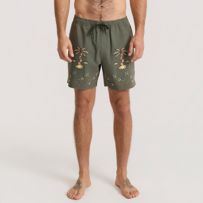 Olive green boardshorts with gold embroidered palm tree and eye motifs, drawstring waist, worn by shirtless man on neutral background
