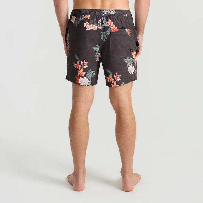 Shorey 16" Trunks in Onyx with red and white floral print on model, rear view showing elastic waistband and back pocket