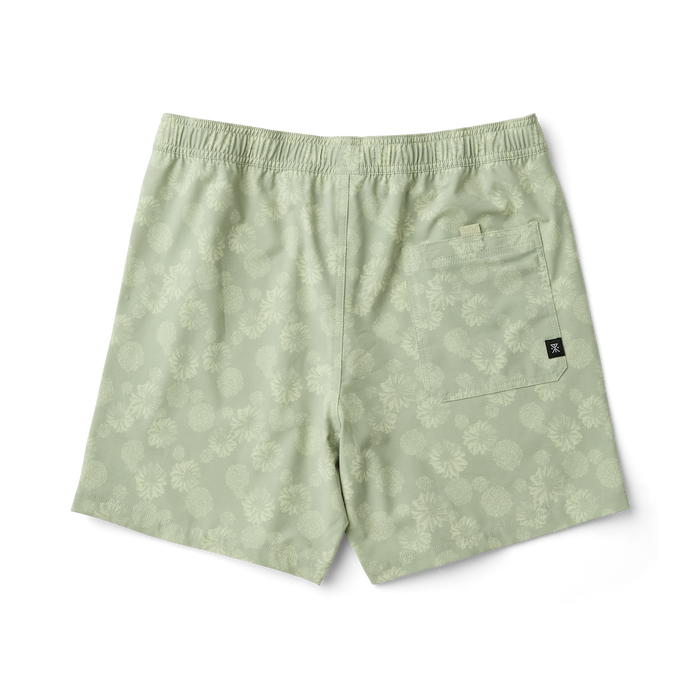 Outdoor-ready Roark boardshorts and Bermuda shorts displayed on tropical beach setting, ideal for adventure and travel.