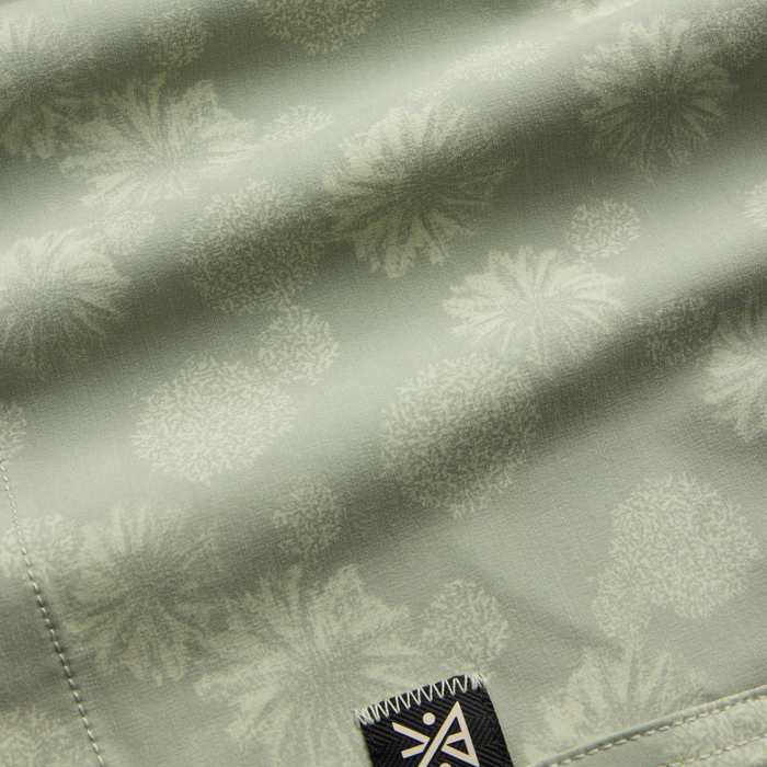 Camouflage-patterned linens styled as a tablecloth with intricate motifs, perfect for outdoor adventures and travel settings.