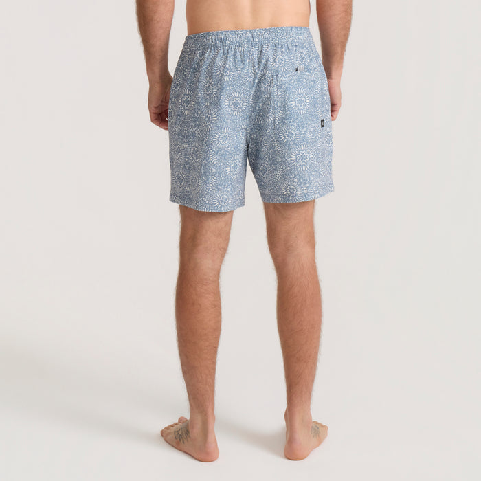 Slate Shorey Boardshorts with allover sunflower print, shown on model from back view