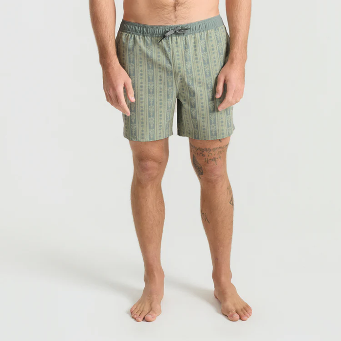 Shorey 16" Trunks in sea foam stripe pattern worn by man standing against white background, full-length view