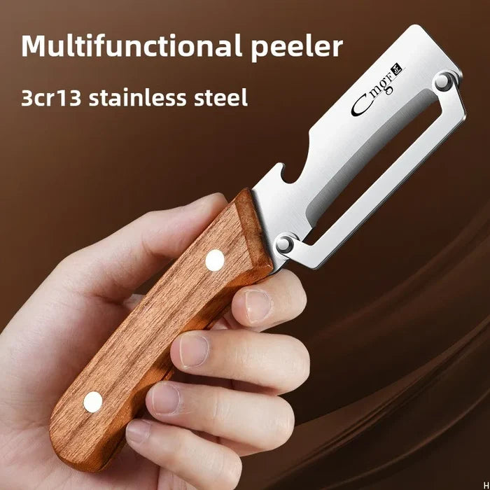 Stainless steel peeler with wooden handle for peeling and slicing fruits and vegetables