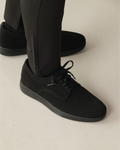 Black shoes worn with black pants