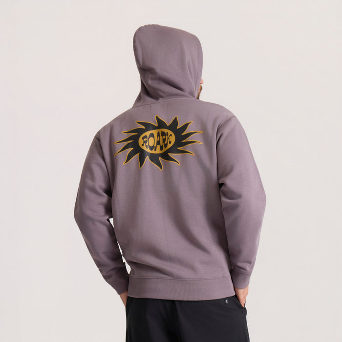 Mauve Sunbeam Hoodie worn by model from back, showing yellow and black sun graphic with ROARK text on chest