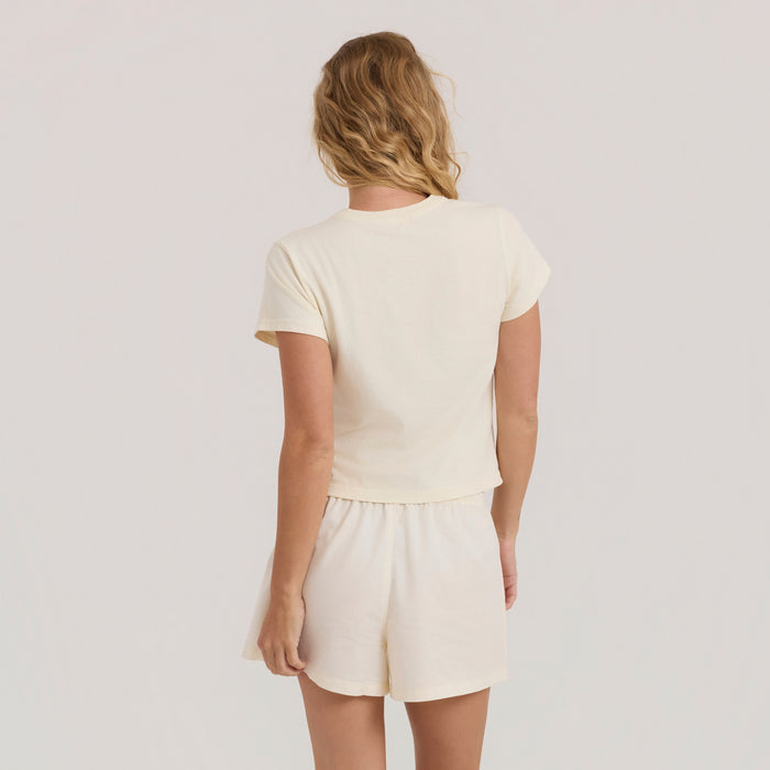 Model wearing versatile Bermuda shorts ideal for night-time adventure by Roark