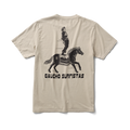 Horse and pack animal engaged in western riding during an adventurous outing, person wearing an active shirt by Roark enhancing the outdoor experience.