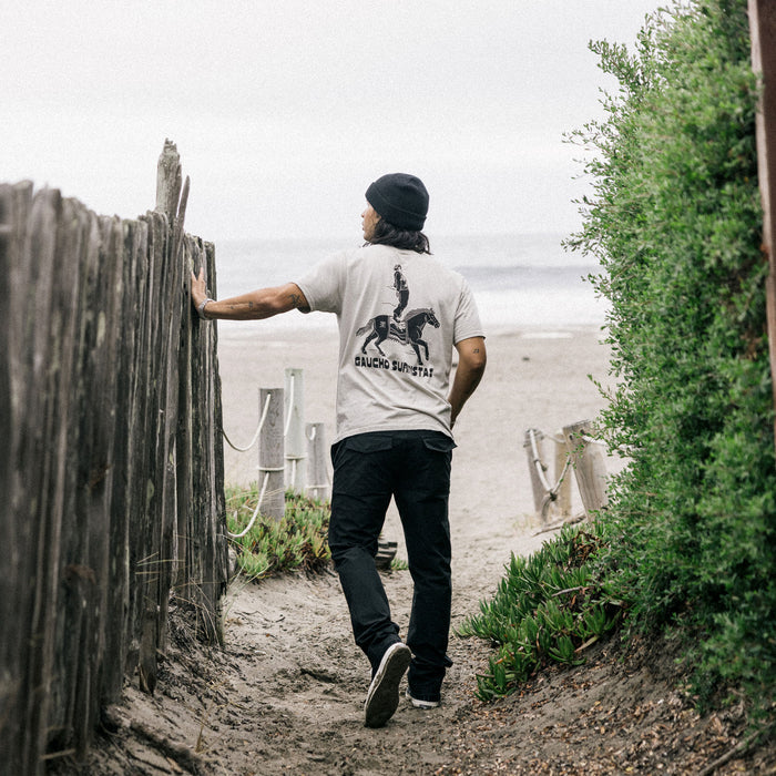 Scenic ocean view with coastal landforms, capturing the essence of adventure and travel, perfect for the Roark Tierra del Sur Surfista Premium Tee.