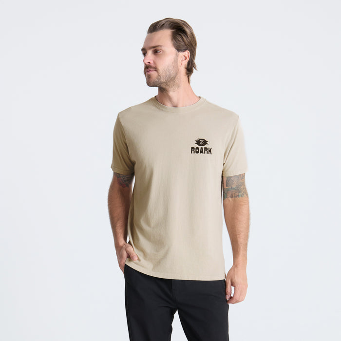 Close-up of an active travel shirt featuring a detailed sleeve and practical pocket design, perfect for outdoor adventures.