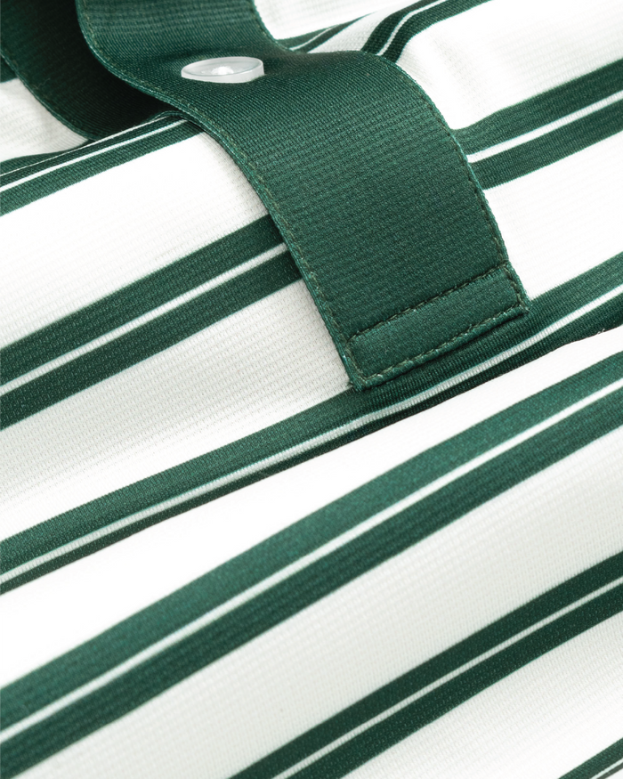 Close-up of a cream and green striped short sleeve polo shirt, showing texture