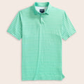 Green and white striped polo shirt on a light pink background