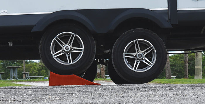 Valterra StayPut Trailer Jack lifting dual axle RV trailer tire for tire change - In Use | United RV Parts