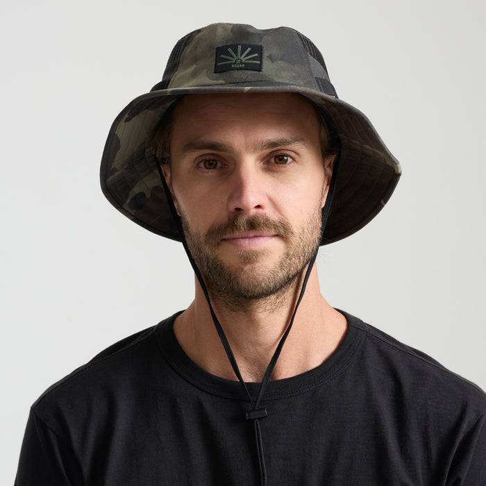 Stylish fedora and sun hat in camouflage pattern, perfect for outdoor adventures and travel.