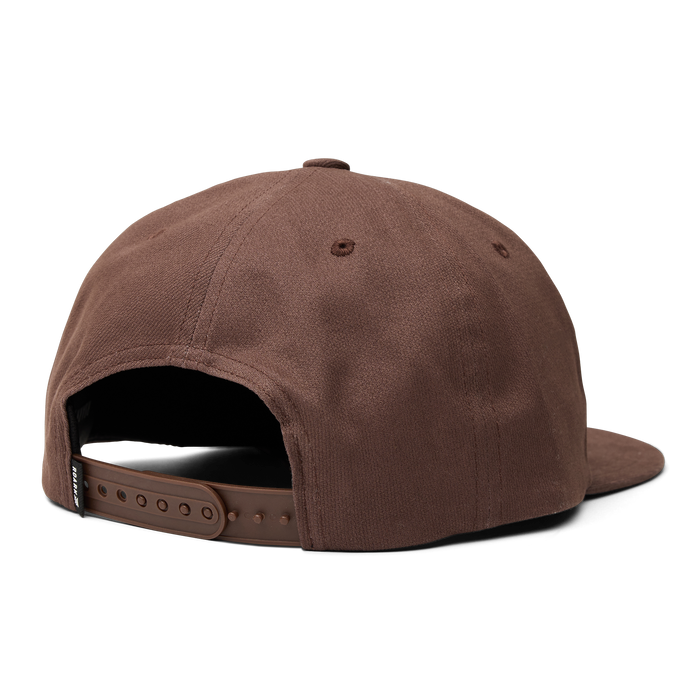 Versatile Roark cap perfect for adventure and outdoor activities, displayed in a natural setting.