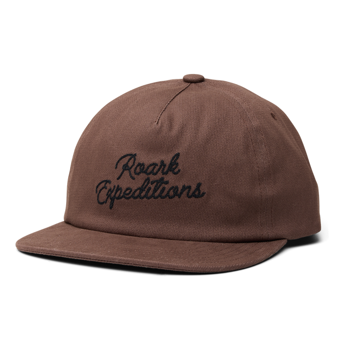 Explore in style with Roark's versatile cap featuring a prominent label, perfect for cricket, baseball, and outdoor adventures.