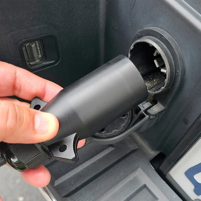 Black ViAir 7-Way Connector Being Inserted - Hand Installation | United RV Parts