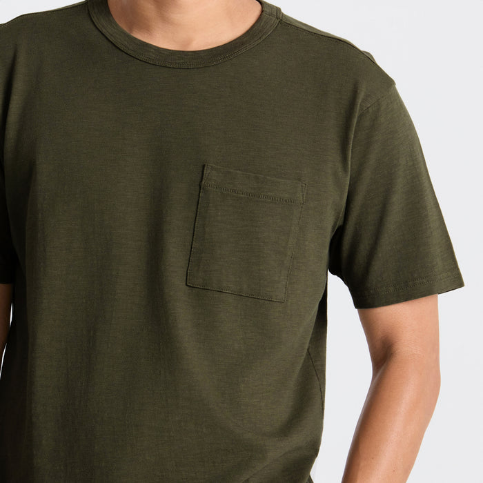 Roark active shirt featuring unique fashion design with a practical pocket, perfect for adventure and travel.