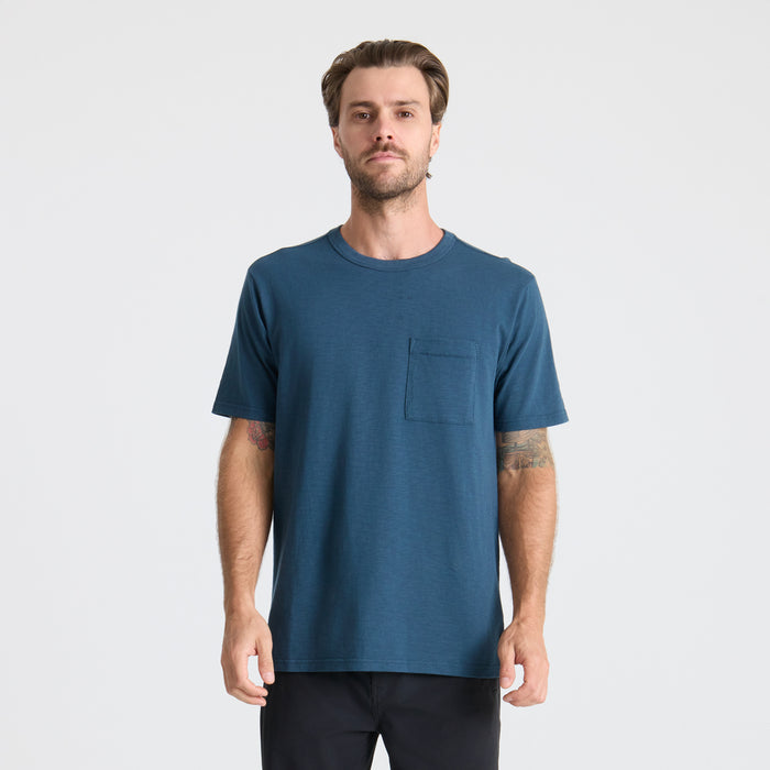 Close-up of a durable navy pocket on Roark outdoor apparel designed for adventure and travel