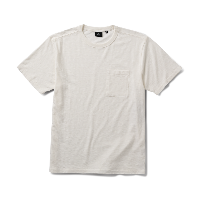 Close-up of a white Roark adventure-inspired t-shirt emphasizing quality textiles and rugged sleeve design.