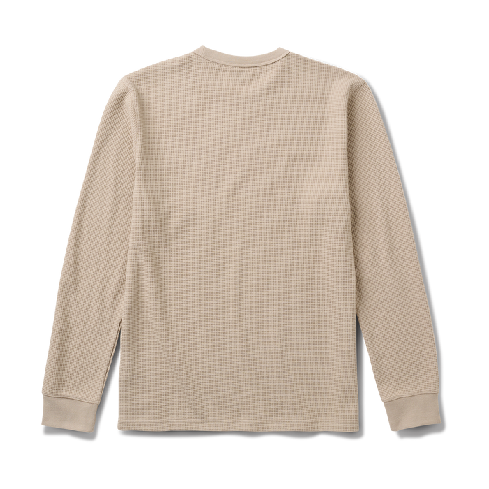 Close-up of a long-sleeved, white active shirt, ideal for outdoor adventures and travel, from Roark's collection.