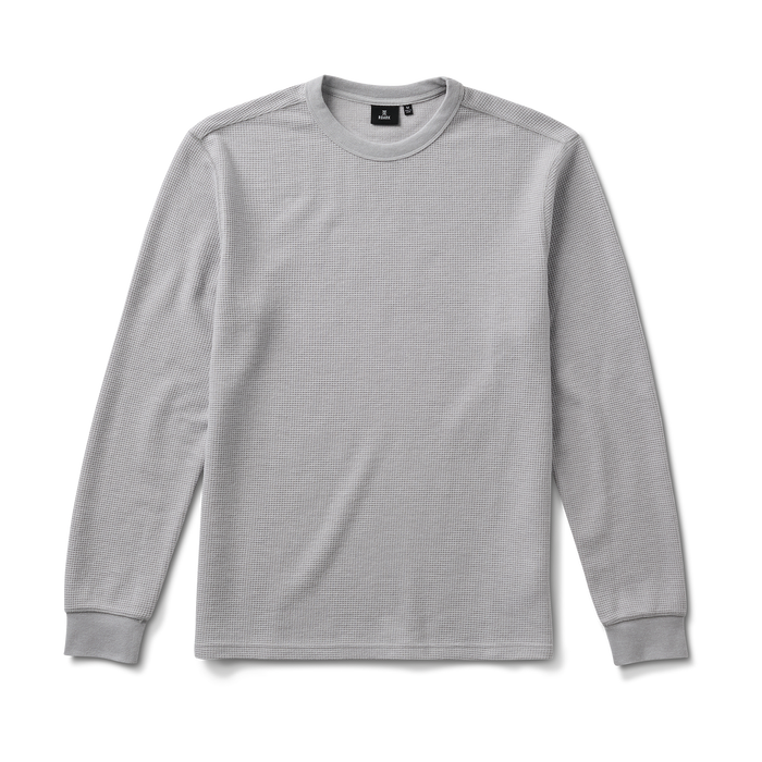 Long-sleeved active shirt in grey, ideal for outdoor adventures and travel, featuring durable sleeves for active use.
