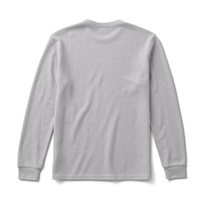 Close-up of a long-sleeved, active white t-shirt from Roark, designed for adventure and outdoor activities.